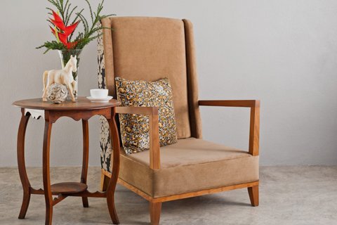 low style brown fabric chair with side table